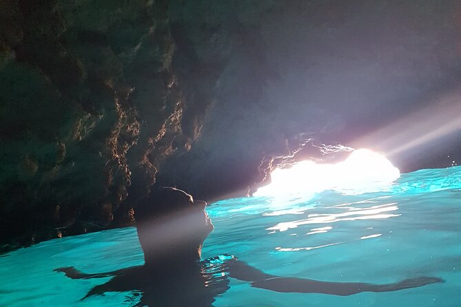 Blue cave tour - 4 caves and sandy beach - Three Sister Caves, rock ledges, and another swim