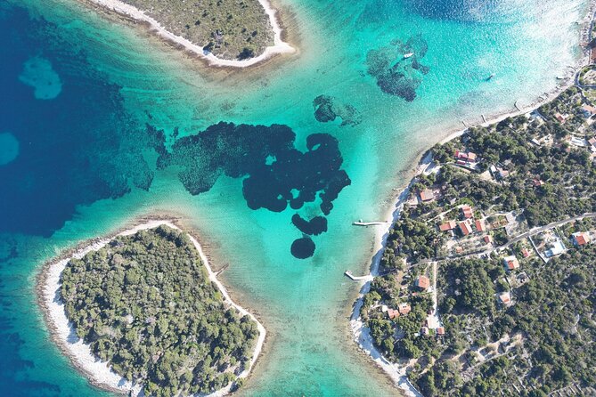 Blue Lagoon Tour from Split with Bottled Water and Wine Included - Krknjasi Bay: one hour in clear blue water
