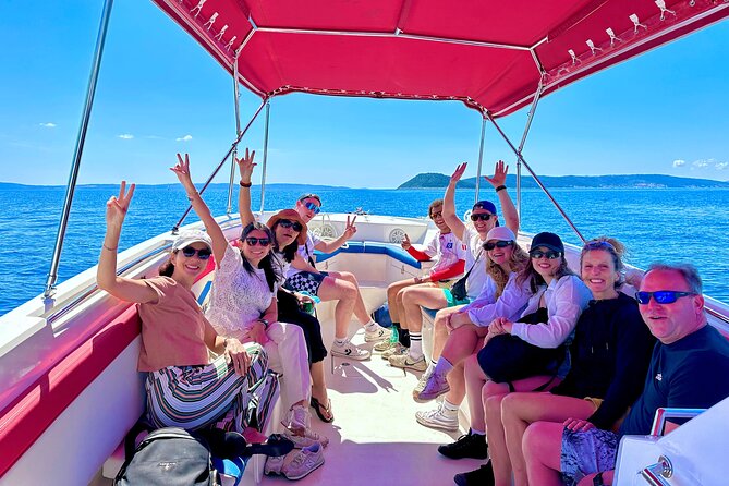Blue Lagoon Tour from Split with Bottled Water and Wine Included - Trogir: one hour among medieval stone lanes
