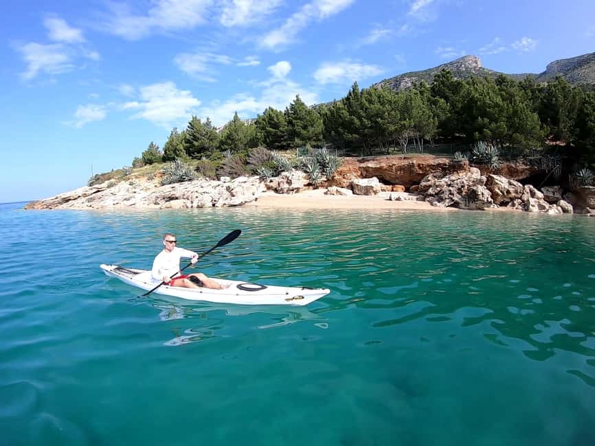 Bol: Zlatni Rat Beach Kayak Tour with Snorkeling - Caves, coves, and a different view of the coast