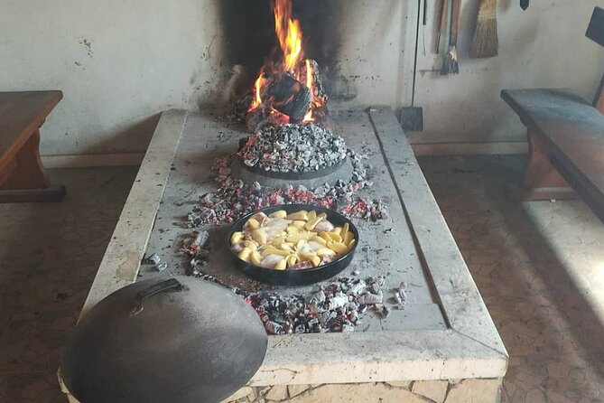 Croatian Traditional Cuisine: Peka Cooking Lesson - Opening the peka and eating the finished dish