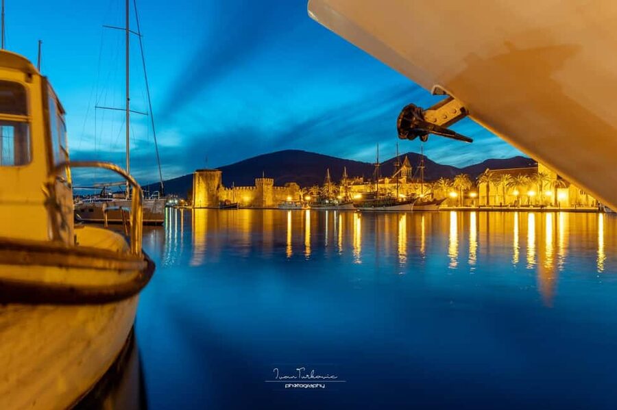 Discover Trogir: Guided Walking Tour of a Medieval Gem - Entering through Trogir’s ancient town gate