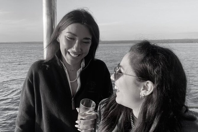 Dolphin Watching & Sunset Boat Tour With Dinner and Drinks - A Bronze Age Fortified Settlement