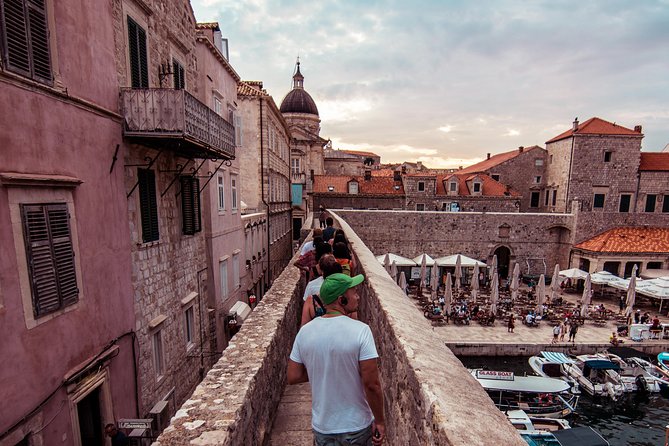 Dubrovnik: Ancient City Walls & Wars Walking Tour - The views are spectacular, but the sun is real