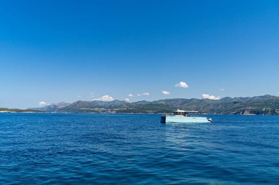 Dubrovnik: Blue Cave Catamaran Tour with Drinks and Snorkel - The Blue Cave: go for the light, not a long exploration