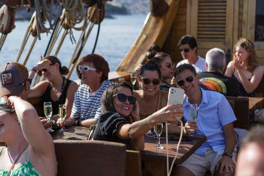 Dubrovnik: Galleon Sunset Cruise with a Live Guide & Drink - Boarding the Galleon Tirena at Dubrovnik’s Old Town port
