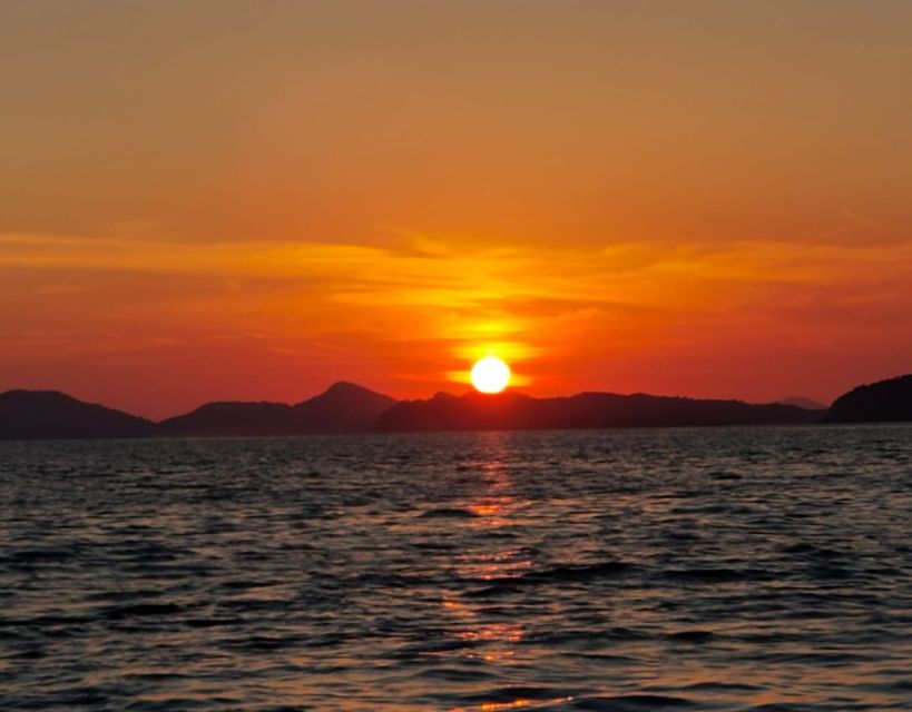 Dubrovnik: Golden Hour Sunset Cruise - Leaving the Old City Port