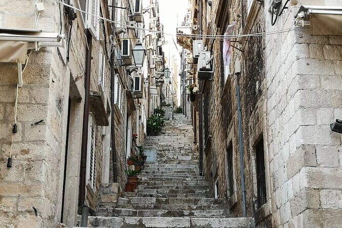 Dubrovnik Old City Walls Private Tour - St. Ignatius, Buža Gates, and views toward Lokrum
