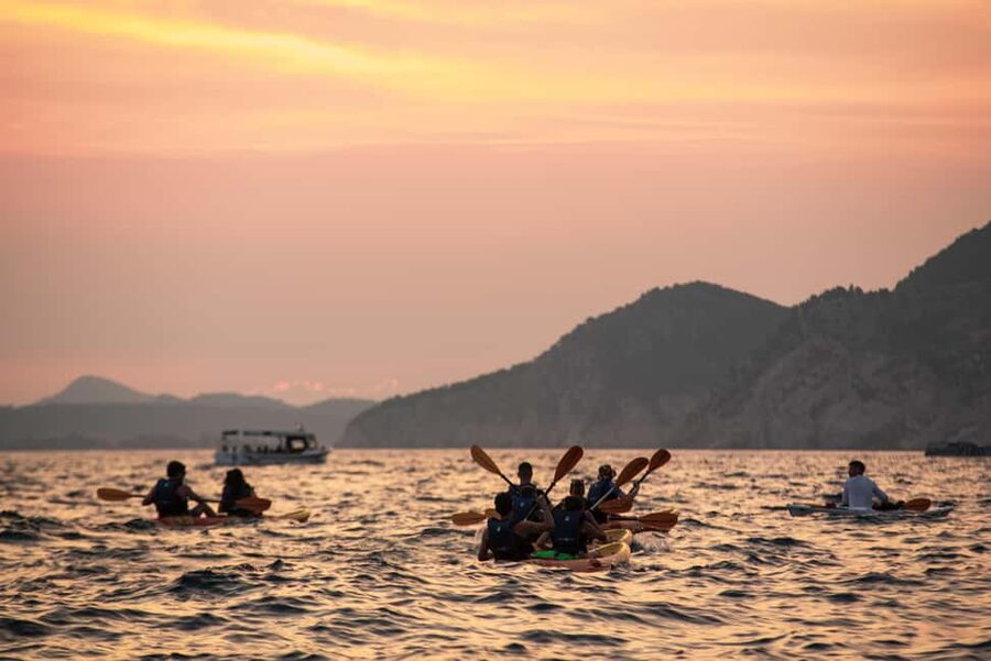 Dubrovnik: Sunset Kayaking and Snorkeling Tour - The safety talk and first strokes near Pile Bay