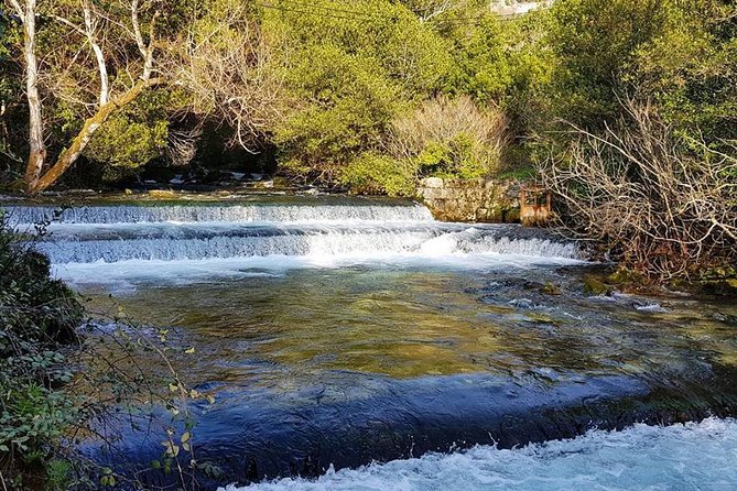 E-Bike Tour + Gourmet Lunch + Wine Tasting (Small Group) - Riding an e-bike through Konavle