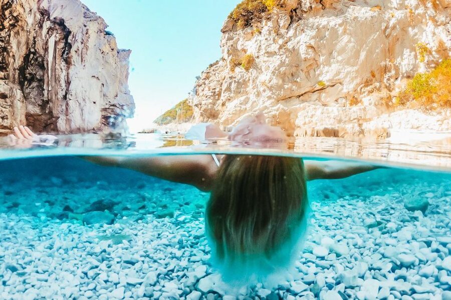From Hvar: Blue and Green Cave Day Tour - Budikovac Blue Lagoon: clear water and open space