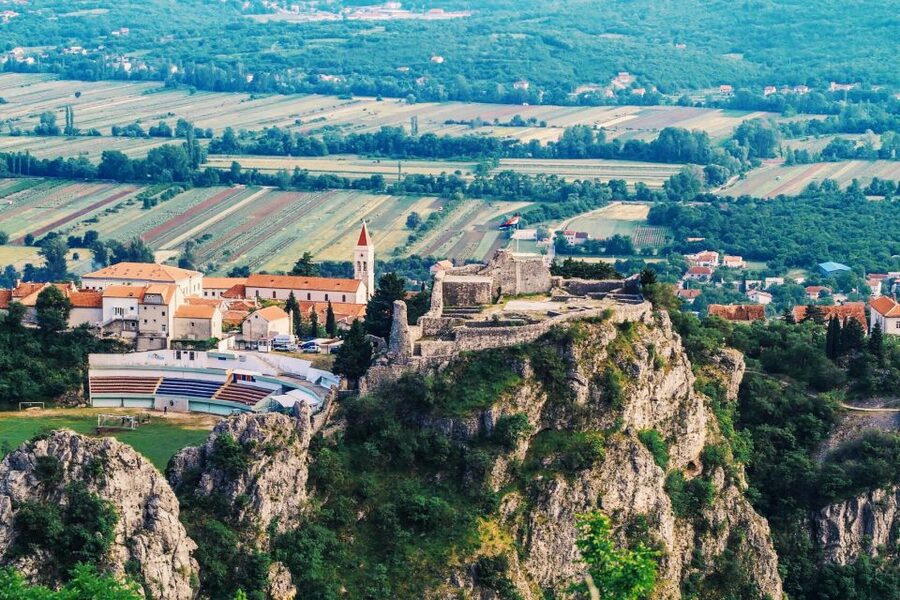 From Sinj: Flight Over Imotski, Trilj, Omiš, and Split - The sweeping view of Omiš at the Cetina mouth