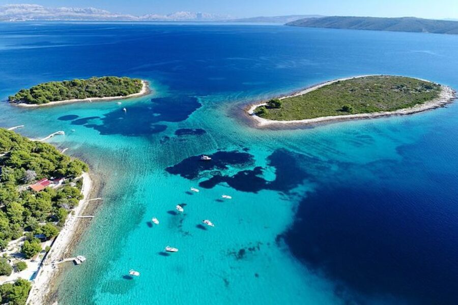 From Split: Blue Lagoon & 2 Islands half-day Private - Passing Trogir from the water