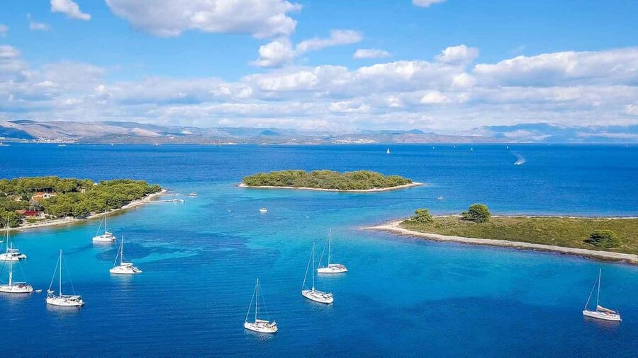 From Split: Blue Lagoon and 3 Island Boat Tour - Trogir: one hour among 4,000 years of history
