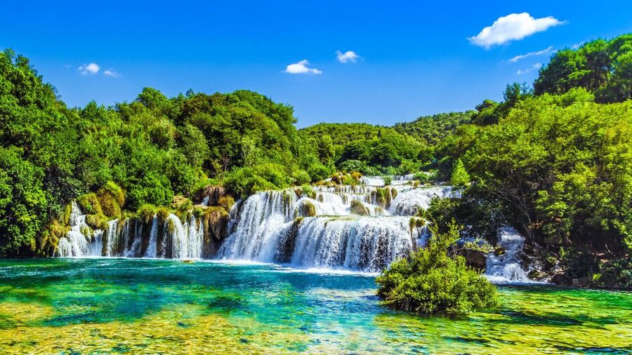 From Split & Trogir: Krka Waterfalls Day Tour with Boat Ride - The riverboat to Skradin