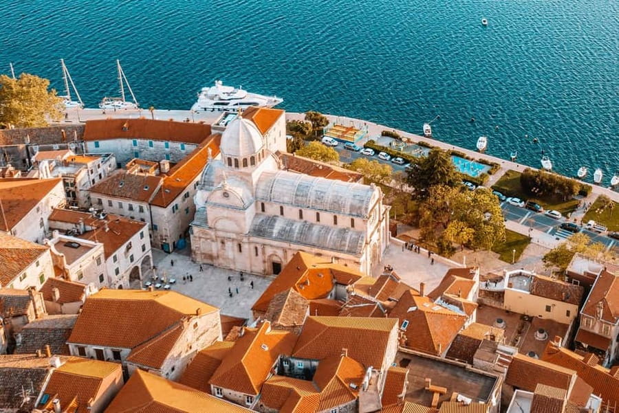 From Trogir, Seget & Okrug: Krka Waterfalls Culture Tour - Primošten, stone lanes, and an Adriatic pause
