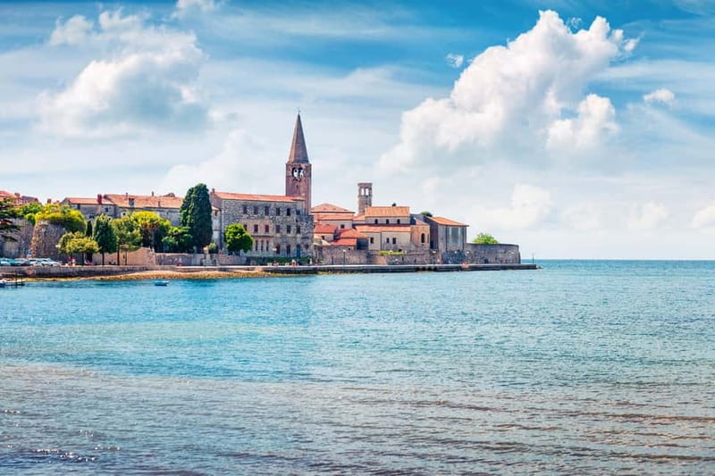 From Umag: Day Cruise to Poreč with Lunch and Swimming - Lunch, wine, and the return to the coast