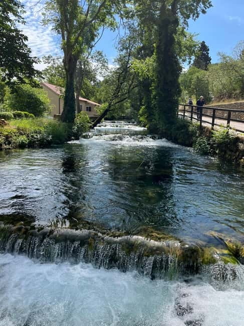 From Zadar: Krka Waterfalls Day Tour - Walking through Krka National Park