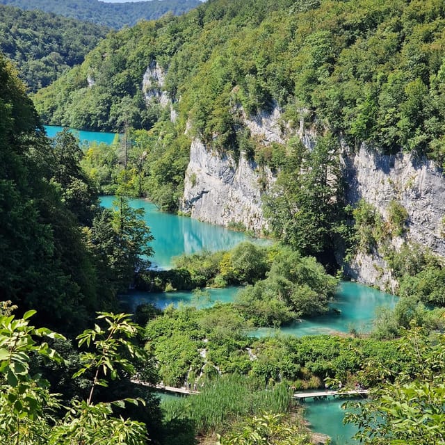 From Zadar: Plitvice Lakes Guided Tour with Boat & Train - The two-hour coach ride inland