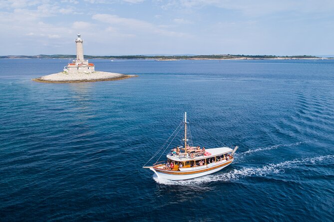 Full-Day Boat Tour of the Medulin Archipelago from Medulin - Swimming beneath Kamenjak’s cliffs