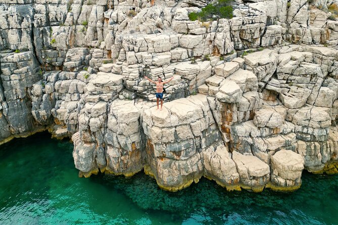 Golden Horn Beach & North Shore of Hvar Island Private Boat Tour - Swimming beneath the cliffs at Mala Stiniva