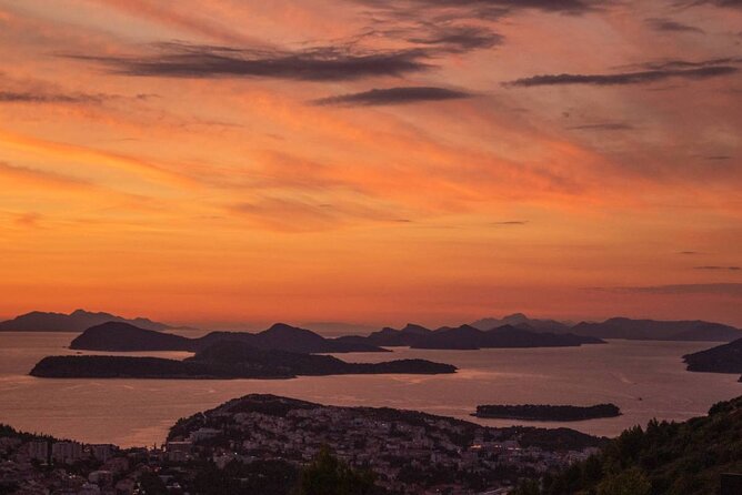 Golden hour SUNSET CRUISE from Dubrovnik Old Town - Passing Lokrum Island as the light fades