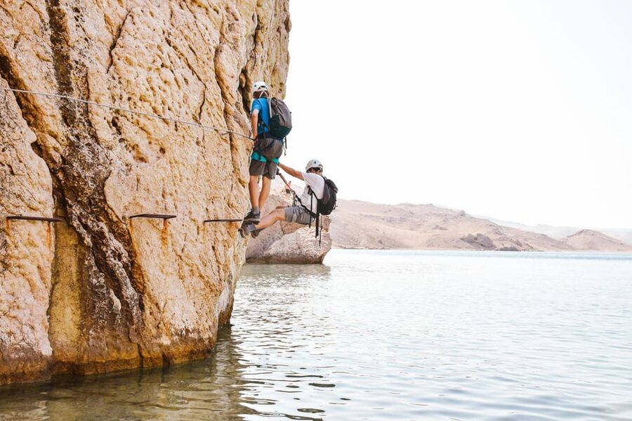 Kayak and Via Ferrata Adventure - Crossing the via ferrata above the sea