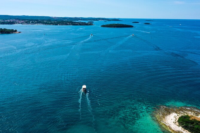 Morning Panorama: Relaxing Among 20 Islands around Poreč Riviera - Drinks, conversation, and the value of $28.90