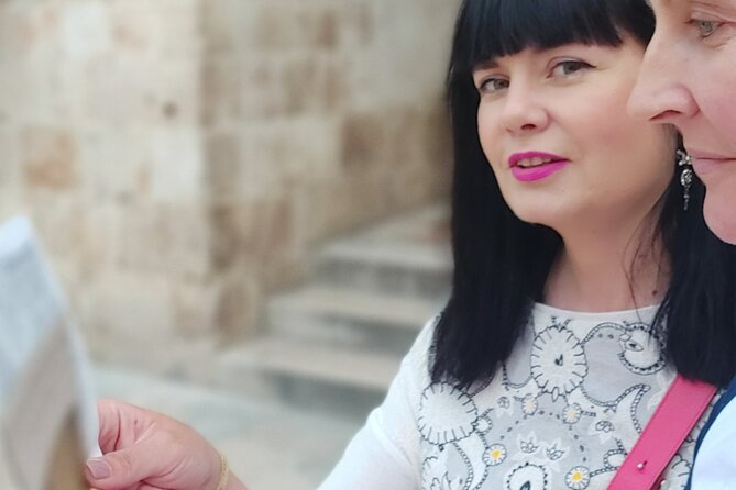 Mysterious Game of Dubrovnik - Private Mystery walking tour - Orlando Column and Saint Blaise connect symbols to the city