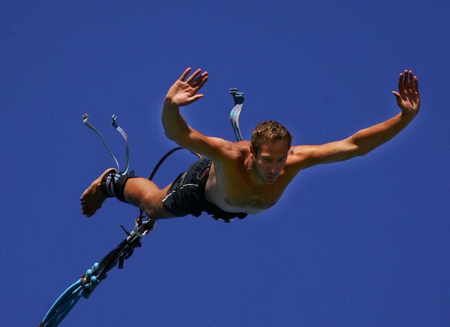 Novalja: Zrce Beach Bungee Jumping Experience - Daytime views and nighttime atmosphere