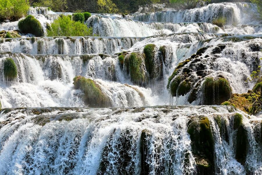 NP Krka tour with Boat Ride and Swimming in Skradin town - Walking the wooden paths at Lozovac