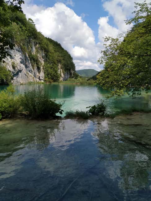 Plitvice Lakes: Guided Walking Tour with Boat Ride - Walking the lower lakes and their waterfalls