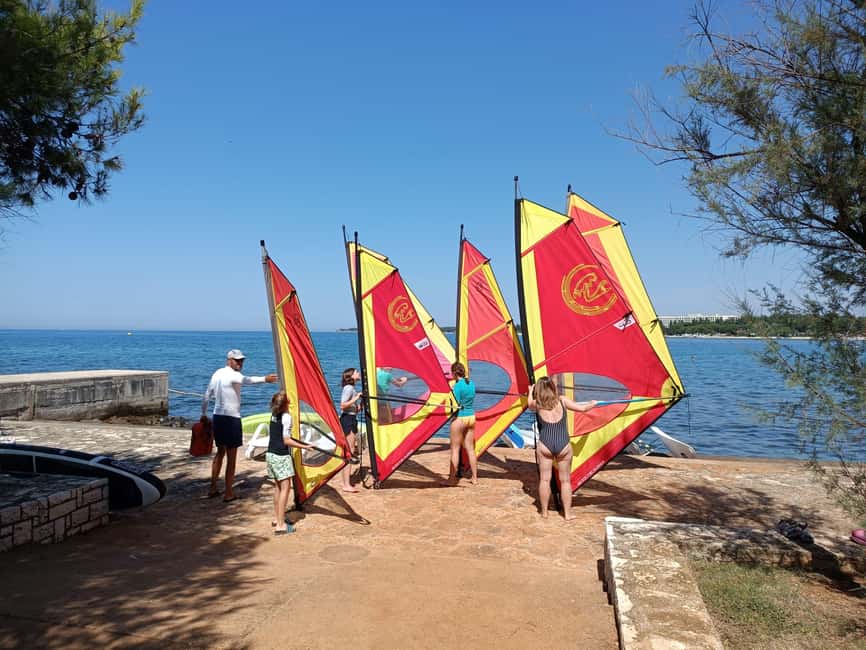 Poreč: 2-hour windsurfing lesson - Taking the board into the clear Poreč water