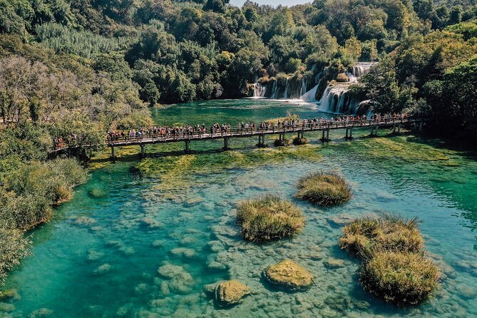 Private Full-Day Krka Waterfalls Tour with Wine Tasting - A boat arrival in old Skradin