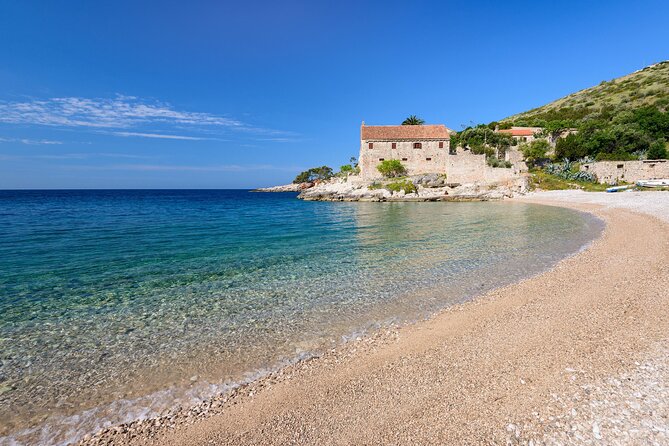 Private Tour of Red rocks, Pakleni Islands and Hvar's Southern Beaches - Lucisca Beach and its cliff-lined swimming cove
