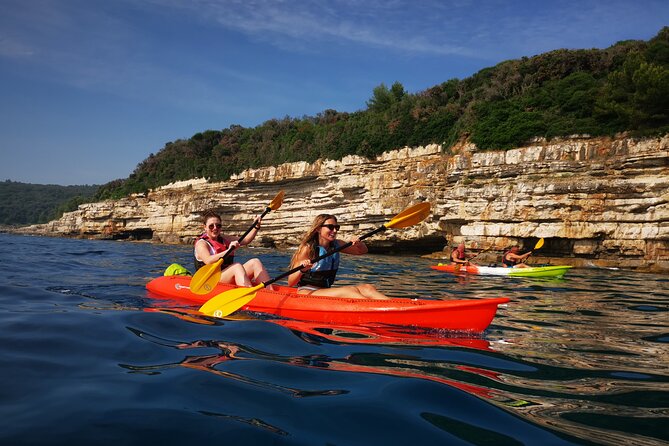 Pula Boat & Kayak Adventure - Paddling below Pula’s highest cliffs