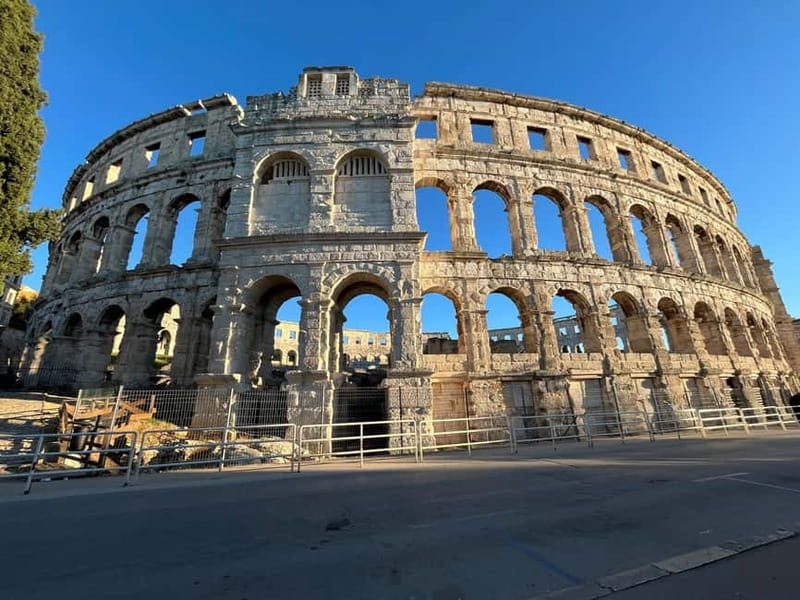 Pula by E-Bike: Roman Ruins, Sea Views & Hidden Gems - Roman monuments in Pula’s old town