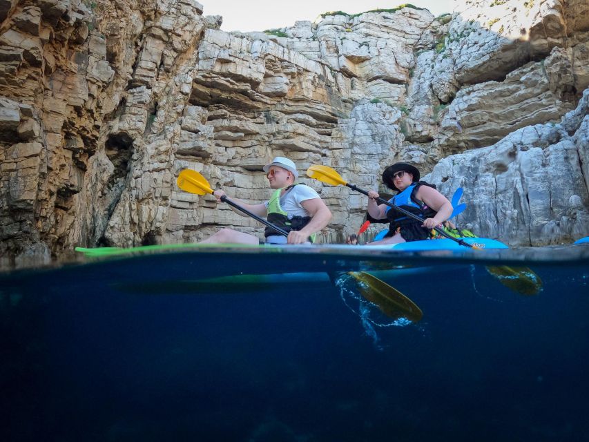 Pula: Kayaking,Snorkeling, Cliff jumping Tour with Wetsuit - Paddling, swimming, and snorkeling along the coast