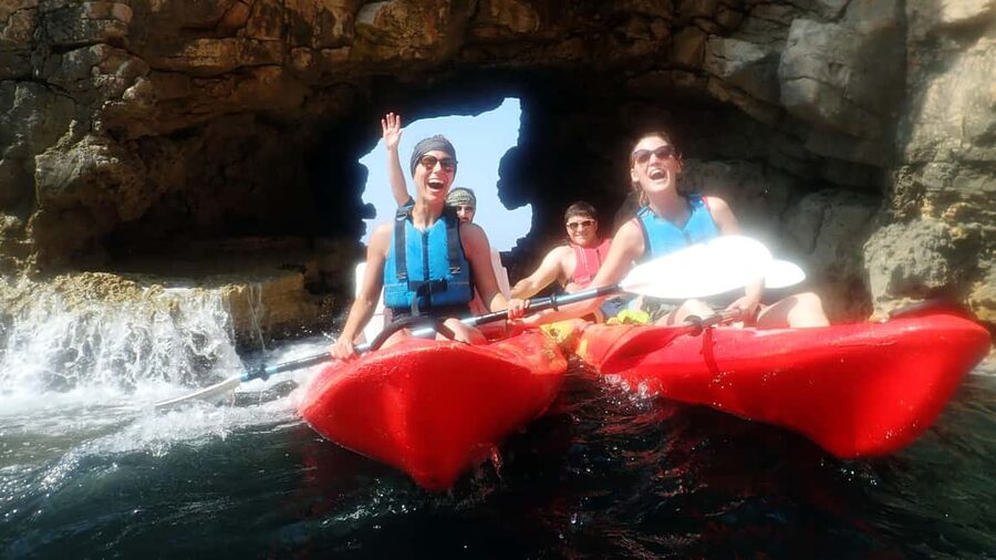 Pula: Sea Adventure – Boat, Kayak, Snorkeling & Cliff Jumps - Paddling past Muzil’s cliffs