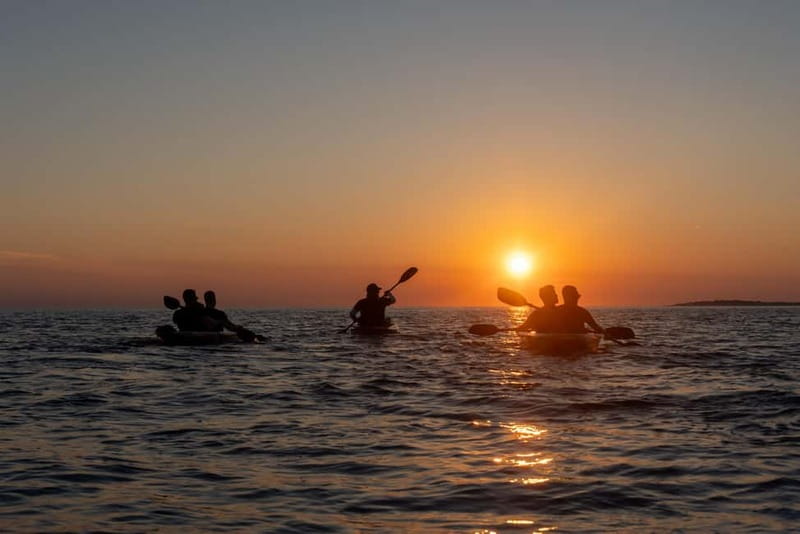 Pula:Sunset Kayak tour with glowing transparent kayak - First stop: the Blue Cave from the water