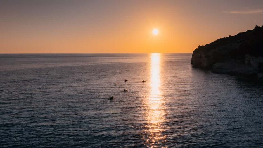Pula:Sunset Kayak tour with glowing transparent kayak - The canyon, wildlife stories, and cliff diving