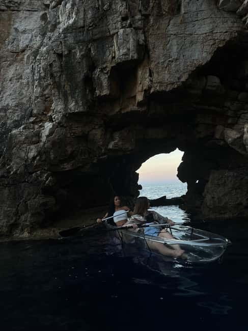 Pula: Sunset/Night Illuminated Transparent Kayak Tour - Entering the illuminated sea canyon