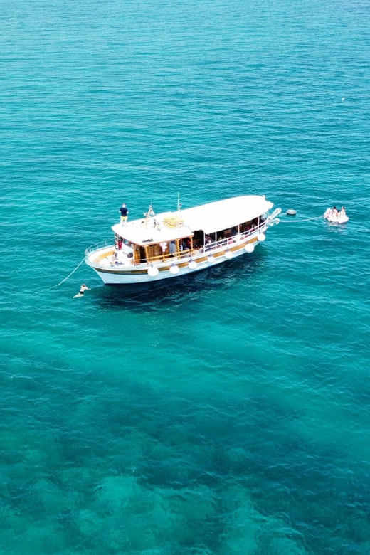 Rovinj half-day cruise: swim stops, drinks & brunch included - Setting out with Rovinj behind you