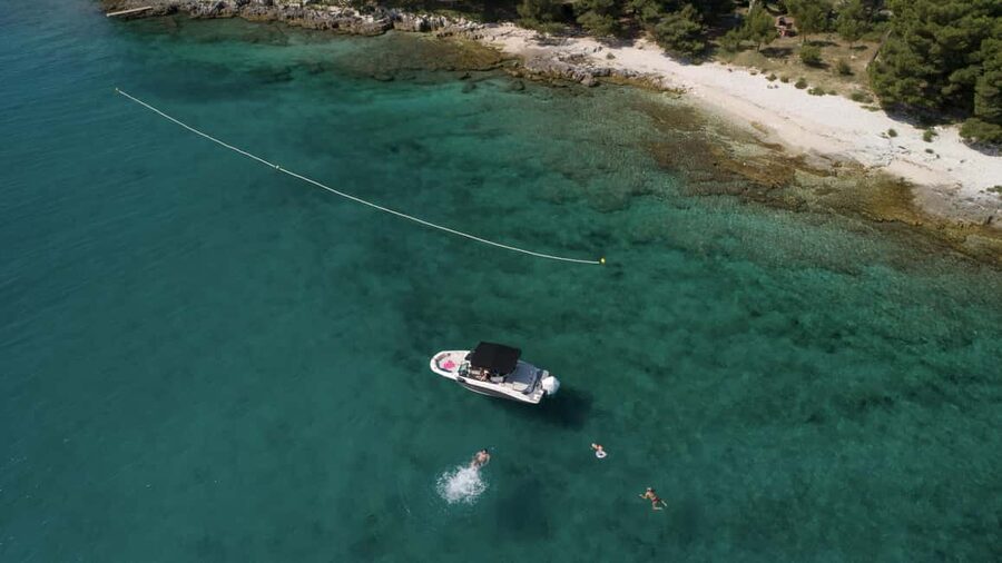 Rovinj: Rovinj Archipelago and South Coves Speedboat Tour - Red Island’s small harbor and island pause