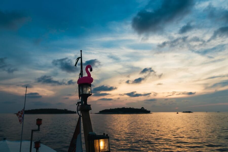 Rovinj: Sunset Cruise with Swim Stop, Drinks, and Fruits - The cruise along Rovinj’s coast