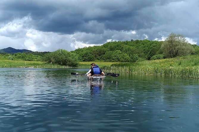 See through kayaks on Gacka river - Clear water, birds, and underwater plants