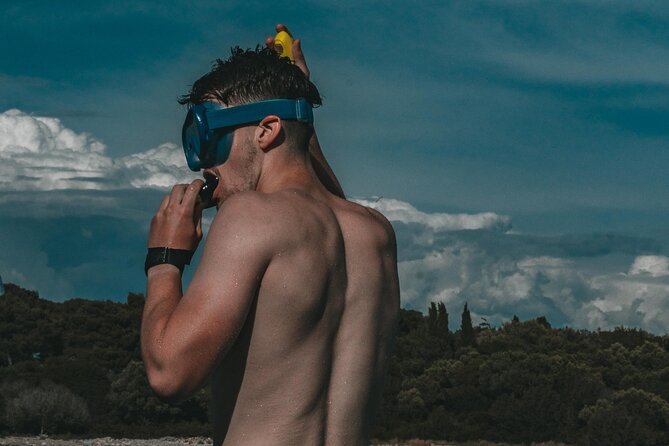 Split: Blue Lagoon & 3 Island Cruise with Wine & Snorkeling - The crew, music, and group atmosphere