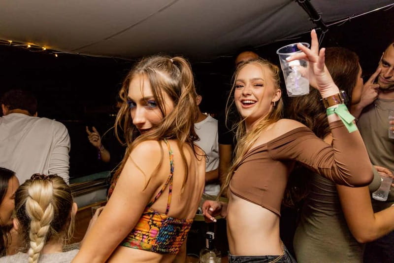 Split: Boat Crawl with Nightclub Access, Shots, & Boat Party - Starting at Jimmy Bar with drinking games