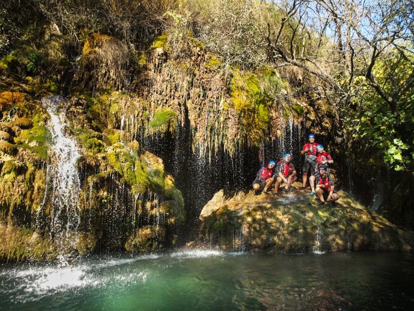 Split: Cetina River Rafting with Cliff Jumping Tour - Cooling off under a spring waterfall