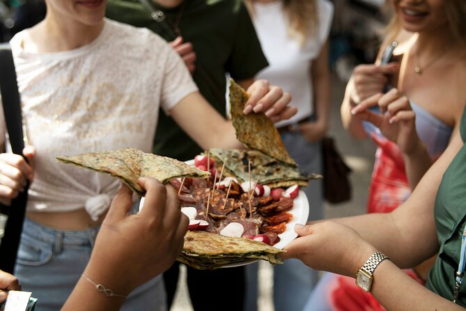 Split History and Gastro Small-Group Tour with Food and Drinks - Finding the orange spoon outside Diocletian’s Palace